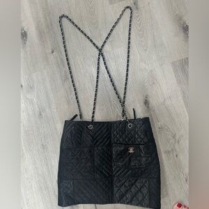 Chanel classic Black Quilted Women's skirt with classic chain suspenders.